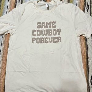 New - never worn. Ivy&cloth - XL ivory- “same cowboy forever” tshirt unisex.